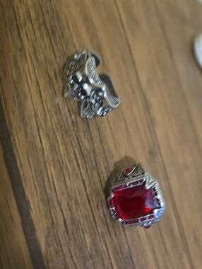 Guess Silver Tone Ring with Large Red Gem and Accent Stones